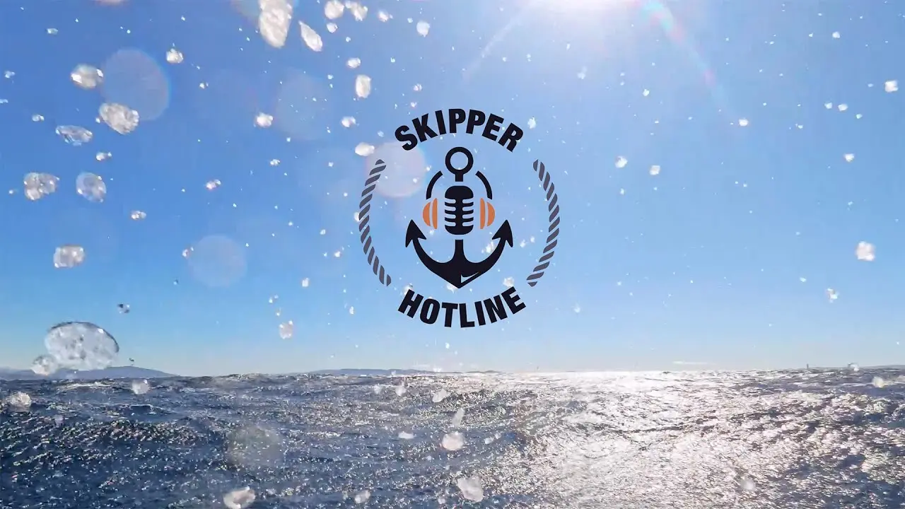 The Skipper Hotline logo over sparkling sea water
